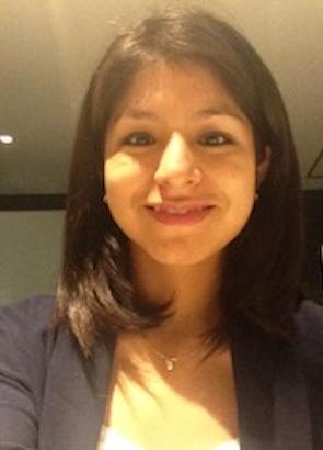 A selfie photo of Yakelyn Ramos Jauregui, a UCAR Fellow, as she smiles for the camera wile wearing a black jacket.